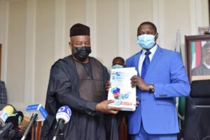 Akpabio presenting forensic report to Malami