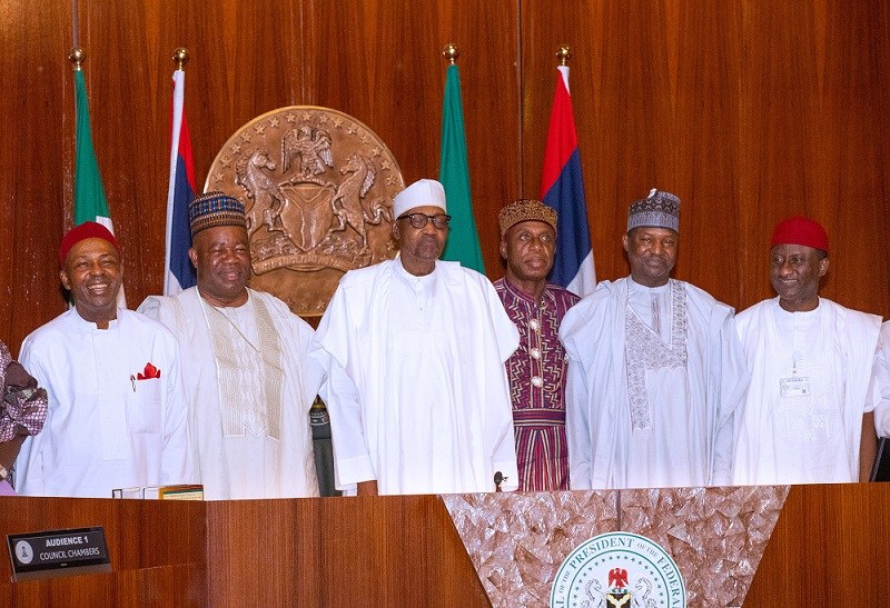 PRESIDENT BUHARI FLANKED BY SOME OF THE MINISTERS